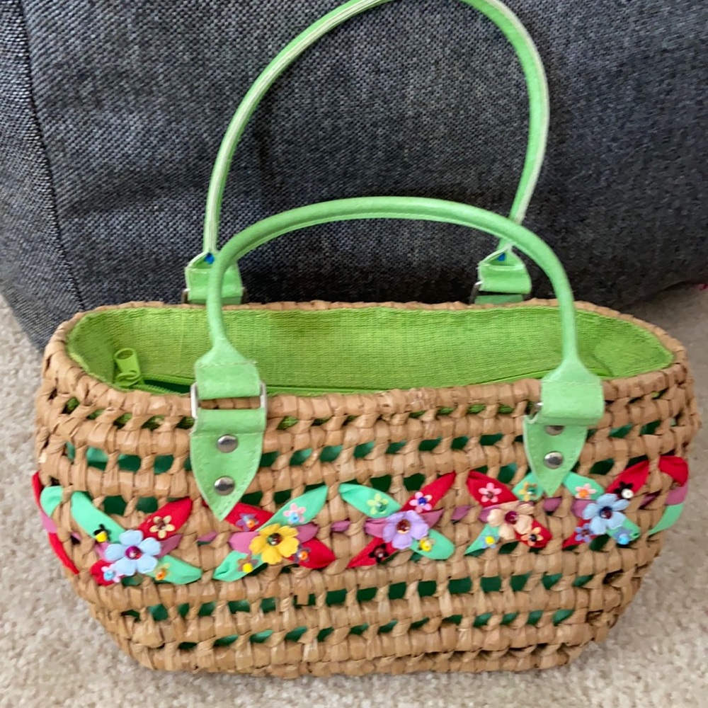 Hand bag made of natural material weaved .